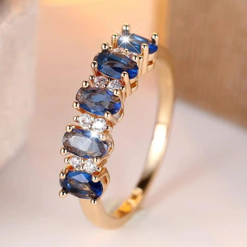 Anillo de banda con acento ovalado alternado