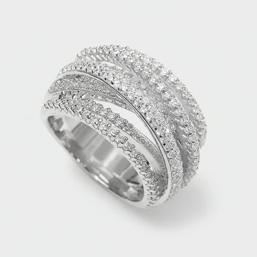 Anillo cruzado de lujo multicapa