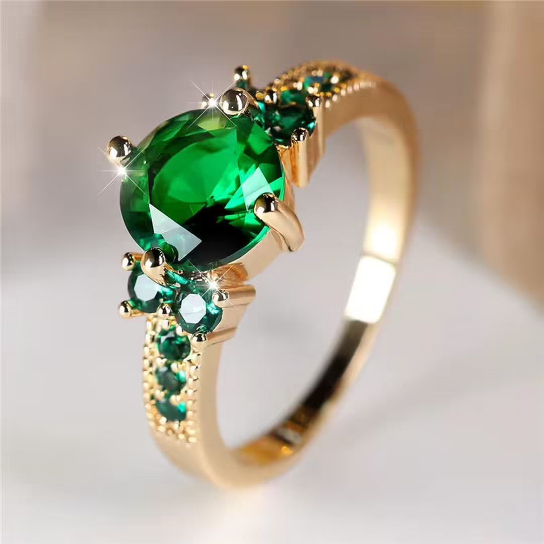 Elegante banda de oro esmeralda vintage