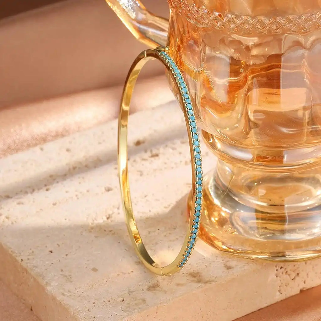 Pulsera de piedra turquesa dorada