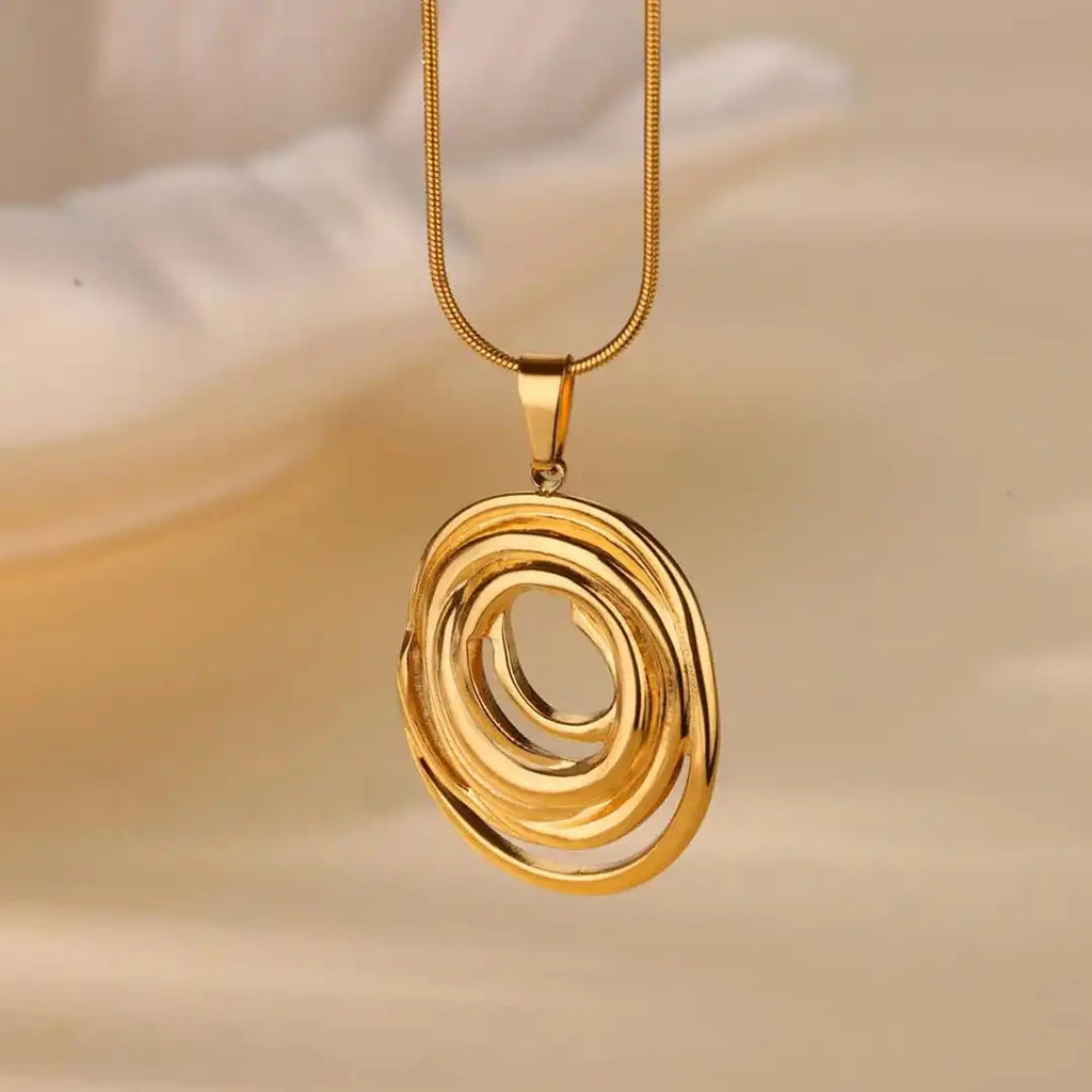 Collar oval geométrico hueco en oro y plata