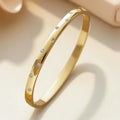 Pulsera de circonita dorada atemporal