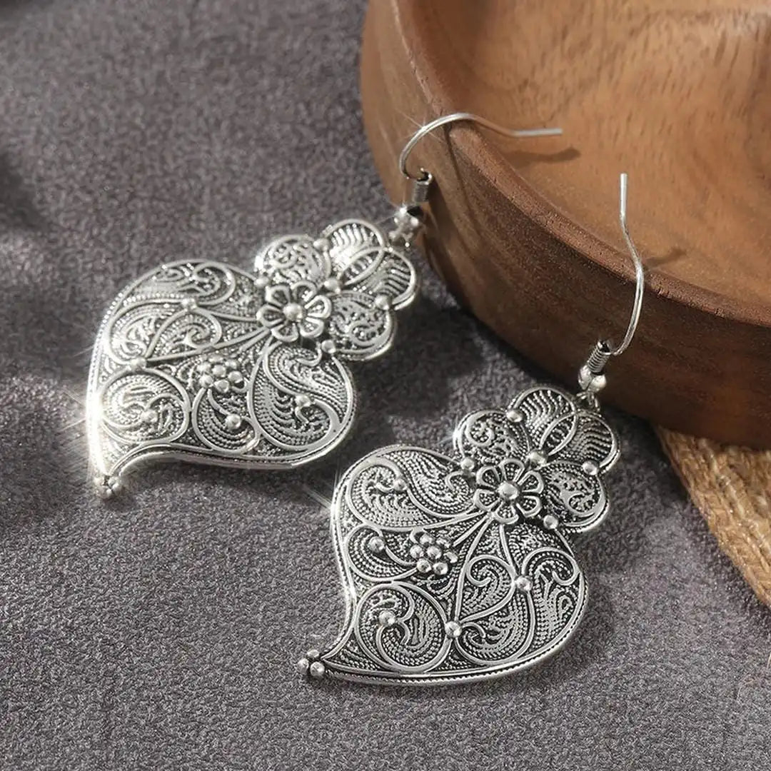Encantadores pendientes de hoja de plata