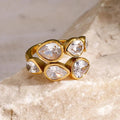 Anillo racimo de cinco lágrimas de piedra