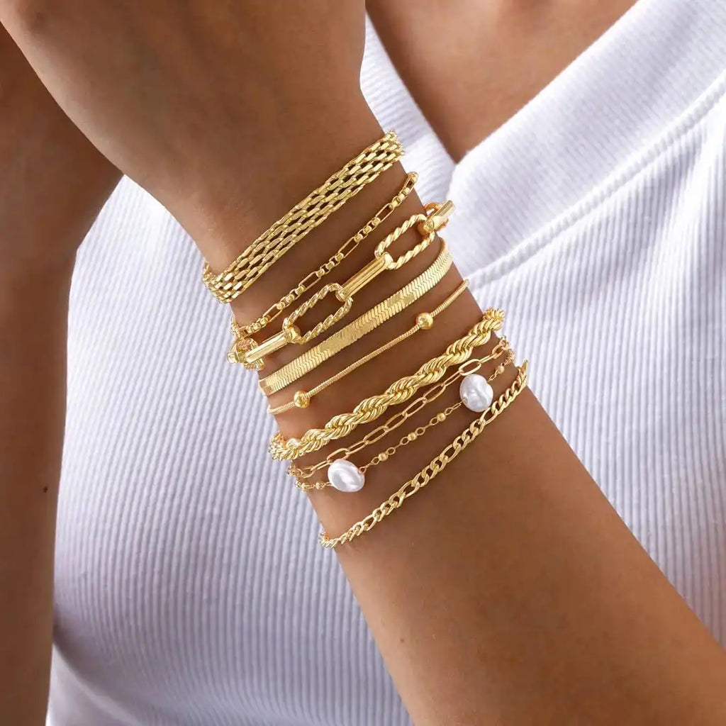 Juego de pulseras apilables de perlas doradas