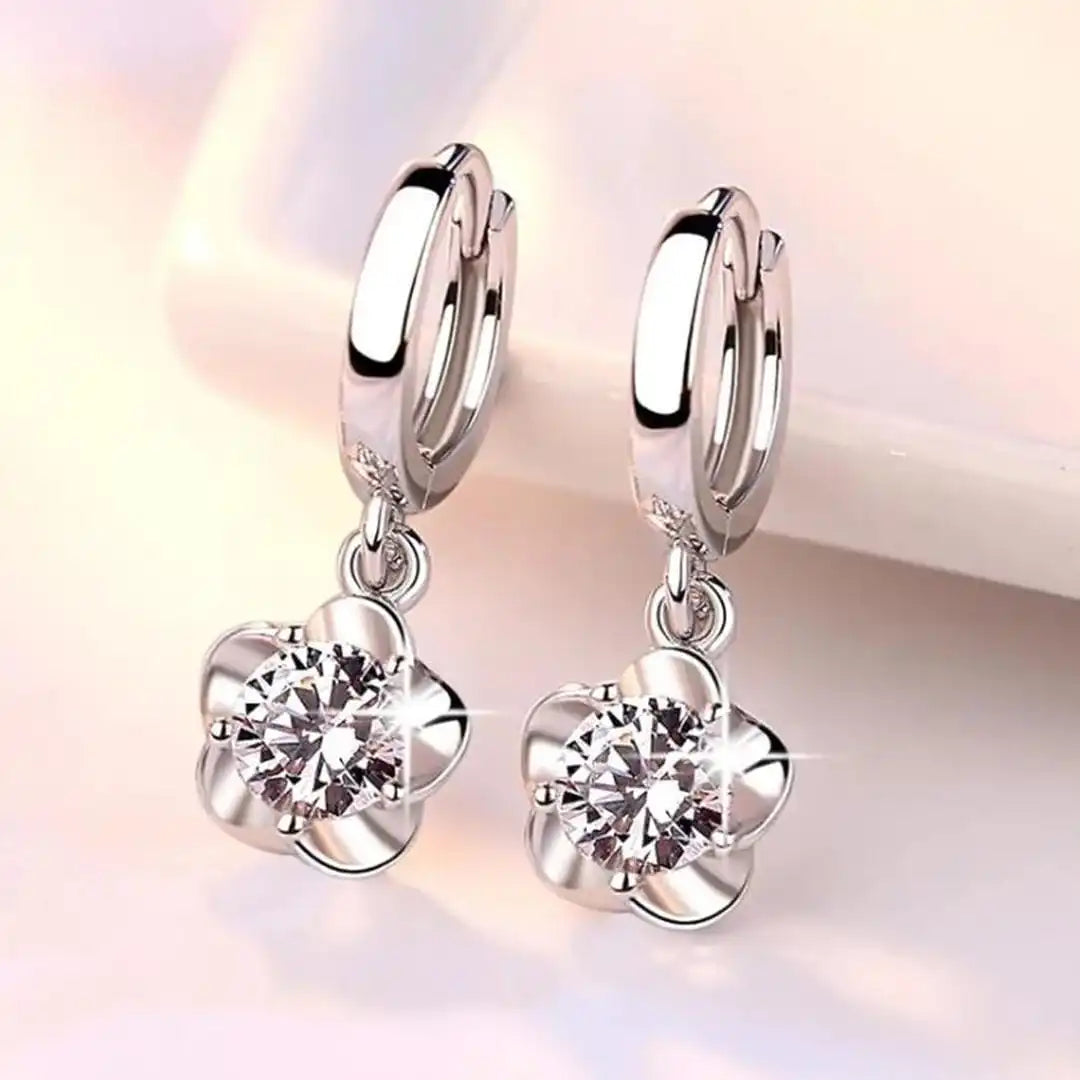 Pendientes de plata de ley con circonitas moradas y blancas