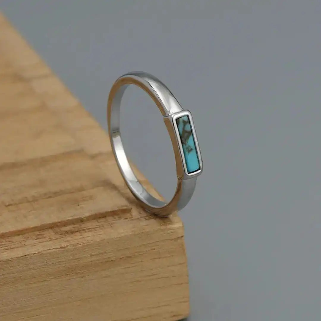 Anillo clásico de plata con barra de turquesa