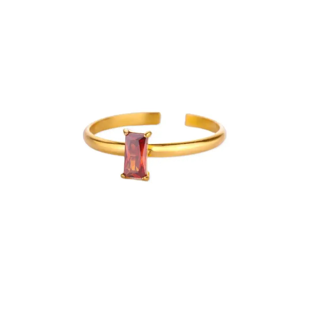 Anillo dorado ajustable y delicado con gema de colores