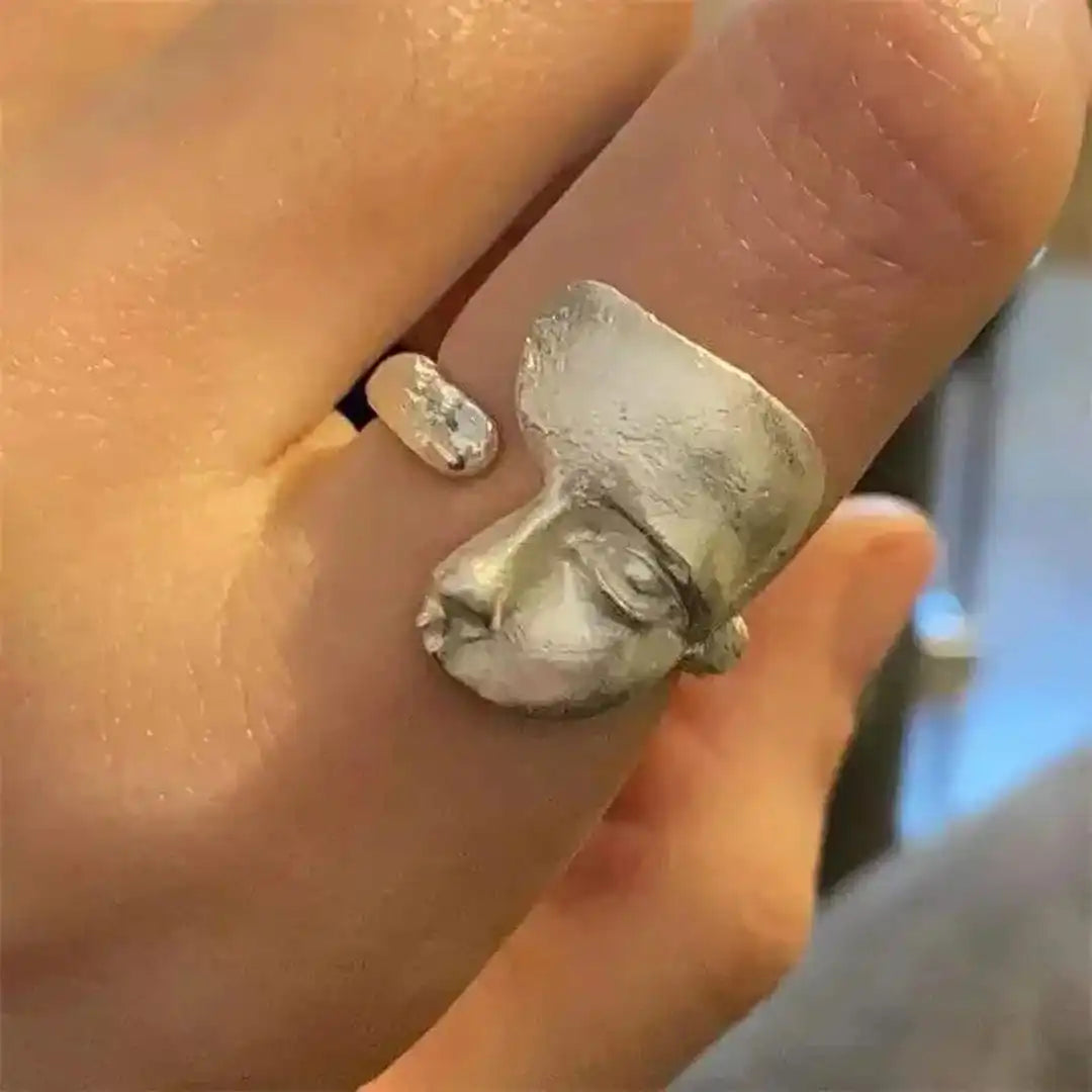 Anillo ajustable de cara abstracta plateado