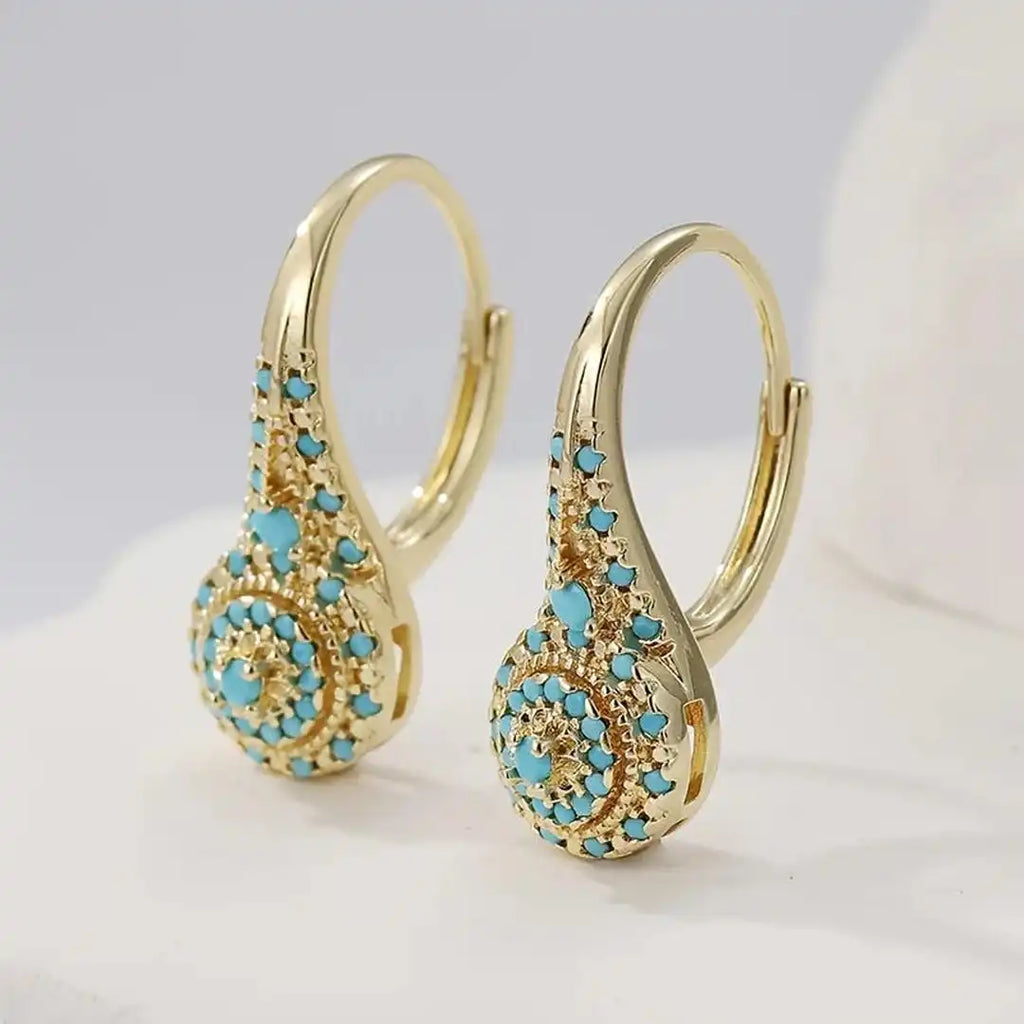 Pendientes elegantes de mandala turquesa