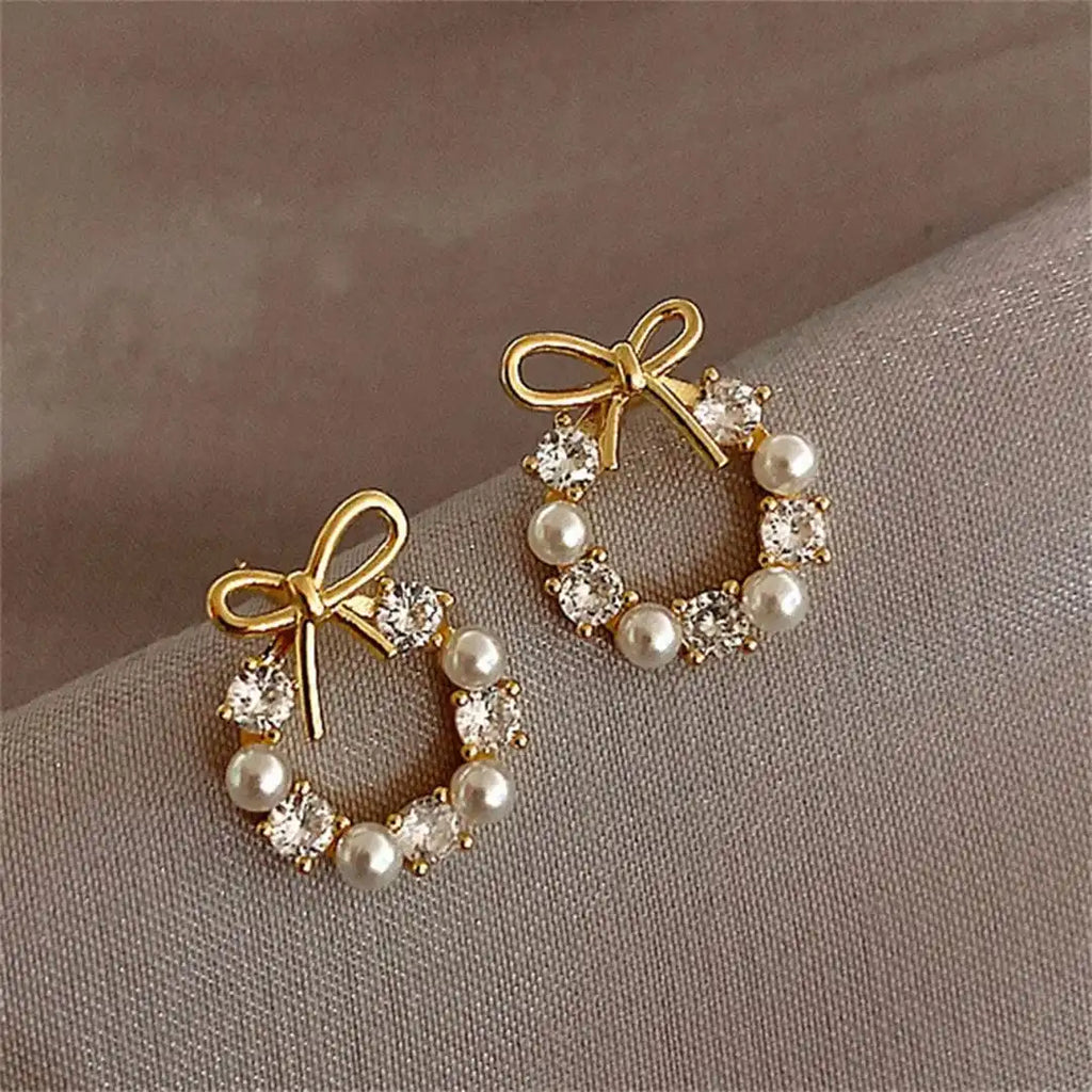Pendientes de perlas circulares con lazo