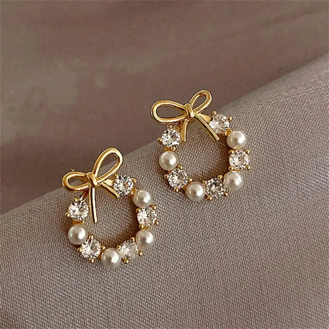 Pendientes de perlas circulares con lazo