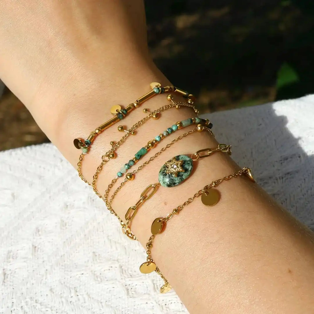 Juego de pulseras de oro con turquesa volcánica