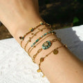 Juego de pulseras de oro con turquesa volcánica