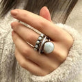 Anillo de órbita clásico de plata con perla