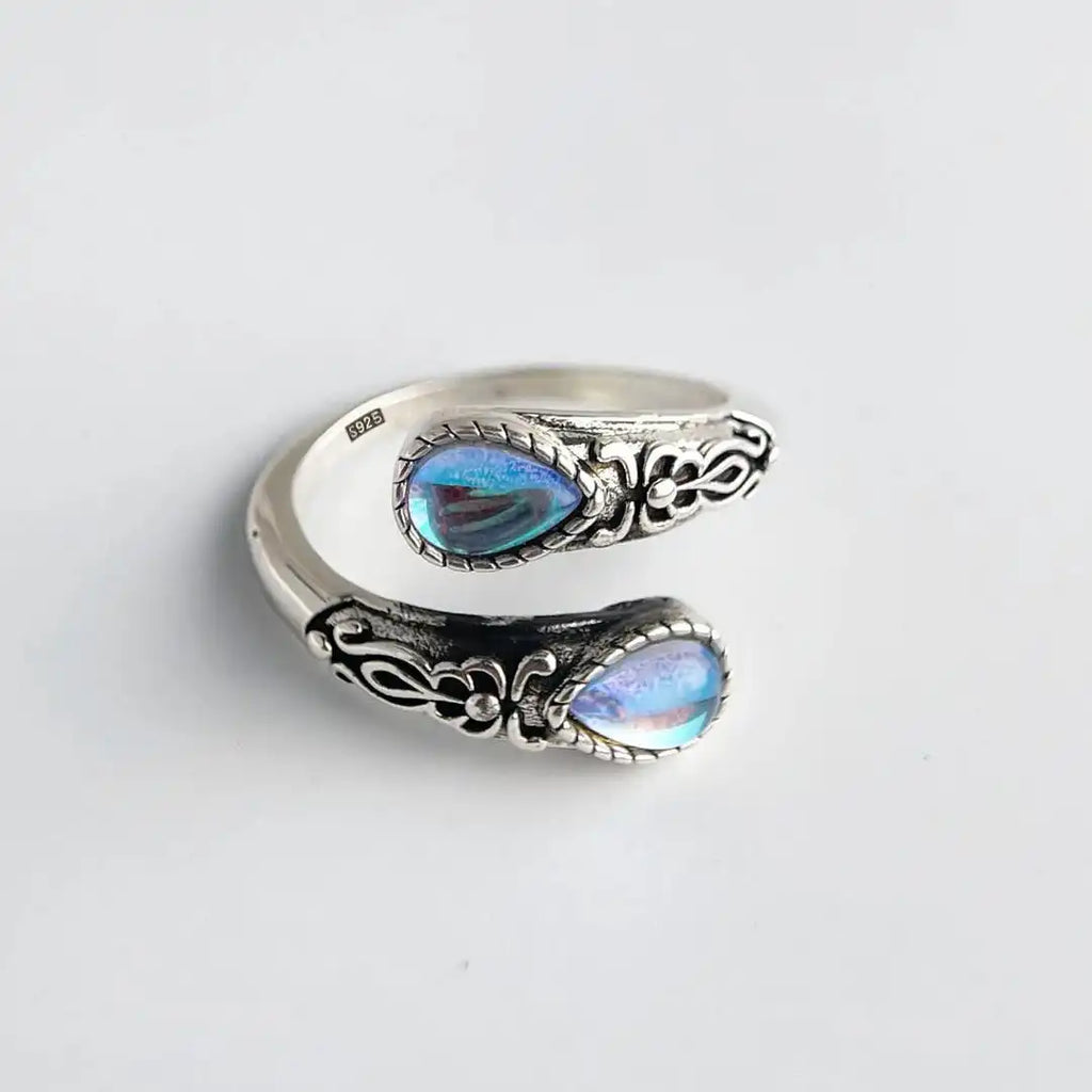 Anillo vintage ajustable de plata con piedra azul