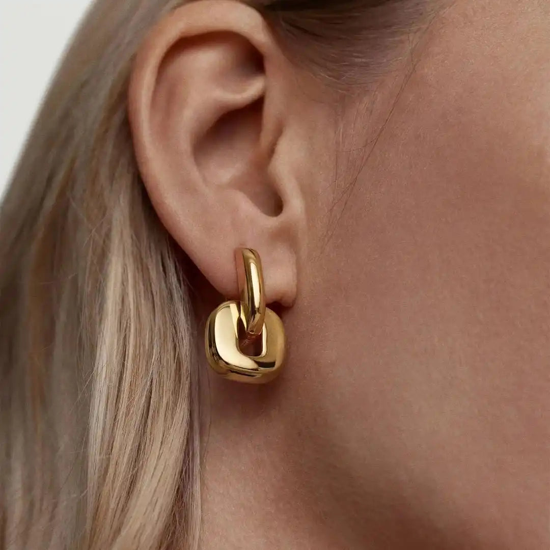 Pendientes ovalados minimalistas de oro de dos tonos