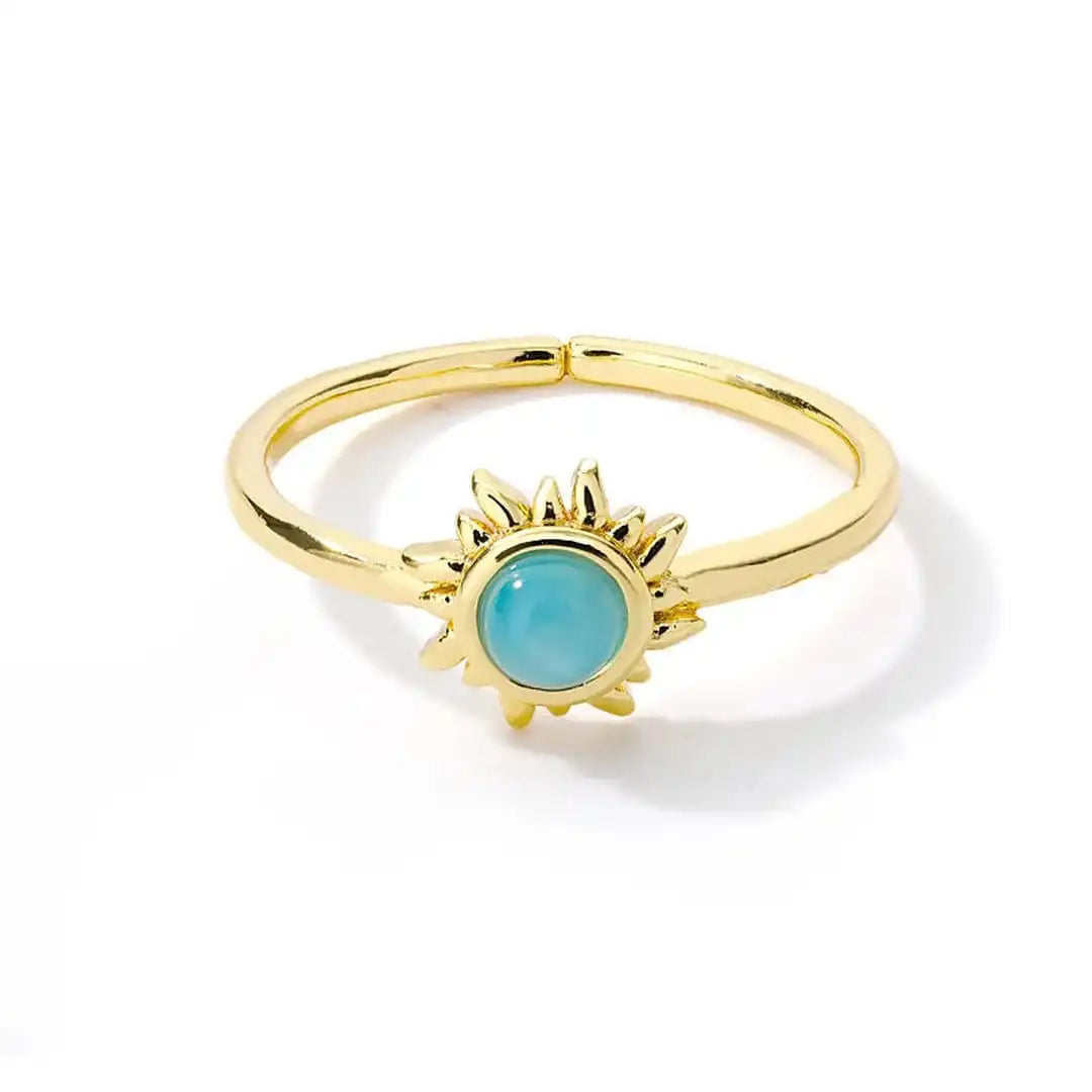 Anillos de sol de ópalo dorados y plateados
