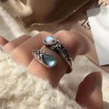 Anillo vintage ajustable de plata con piedra azul