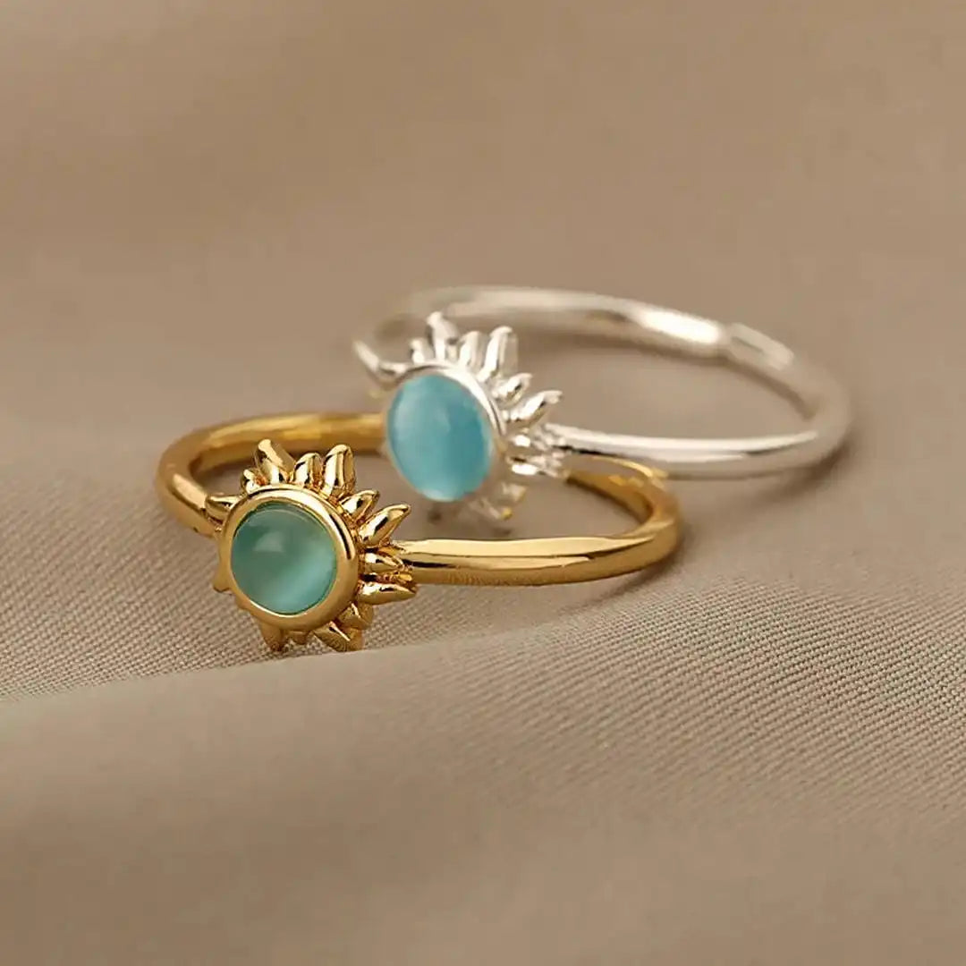 Anillos de sol de ópalo dorados y plateados