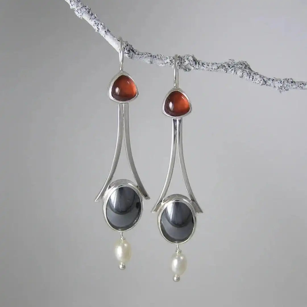 Pendientes de plata con tres perlas y colgante de lágrima
