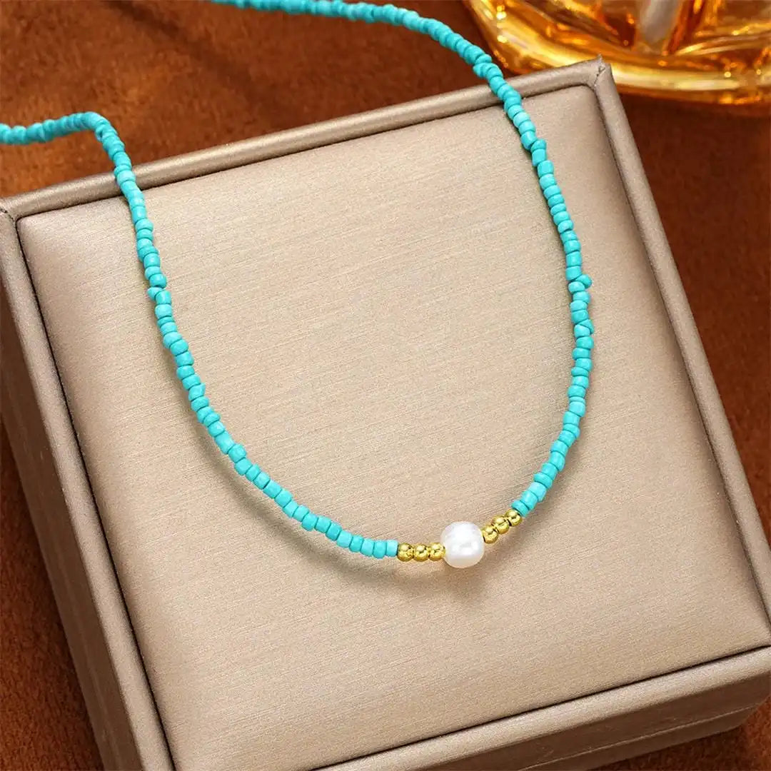 Collar de perlas barrocas con cuentas turquesas