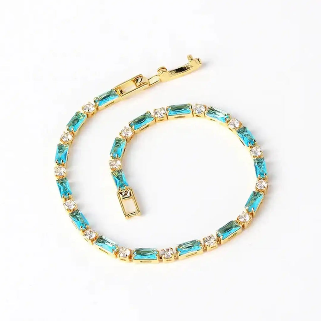 Pulsera de oro con circonitas y piedra turquesa