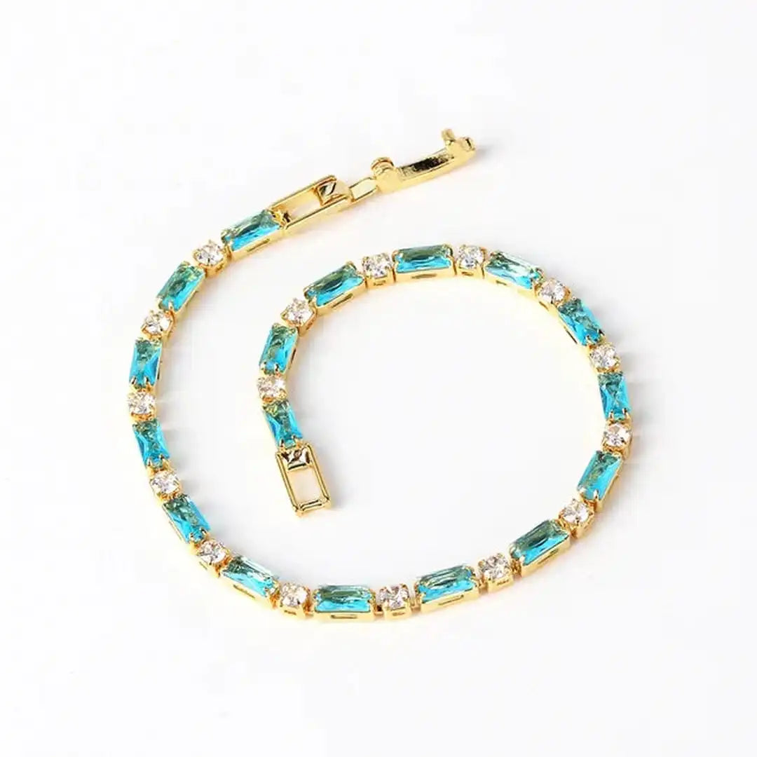 Pulsera de oro con circonitas y piedra turquesa