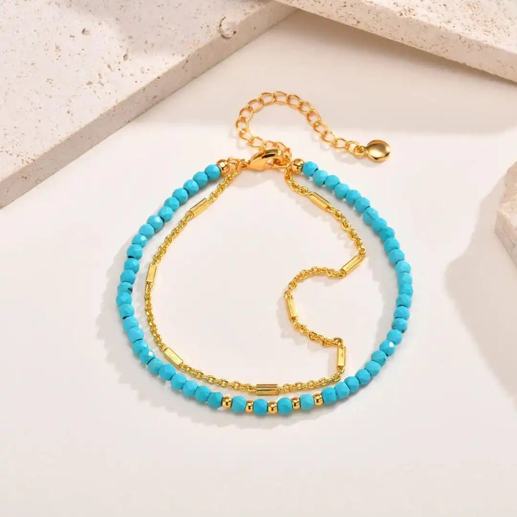 Pulsera de turquesa con doble cadena de oro, estilo atemporal