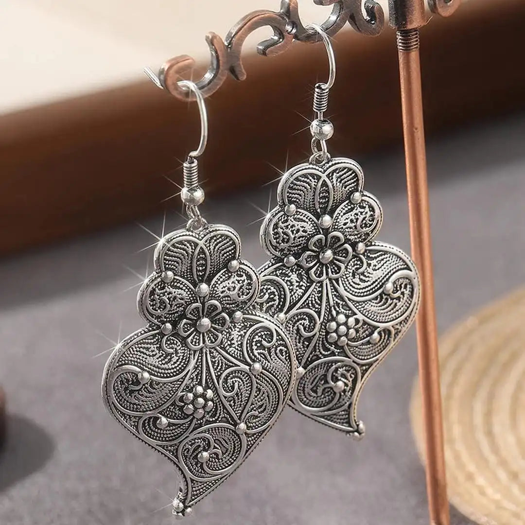 Encantadores pendientes de hoja de plata