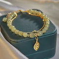 Exquisita Pulsera de Jade Verde y Oro