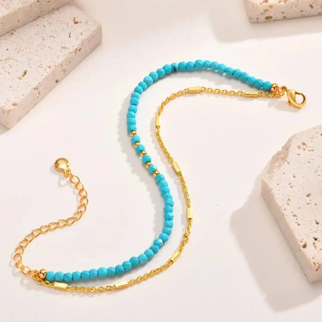 Pulsera de turquesa con doble cadena de oro, estilo atemporal