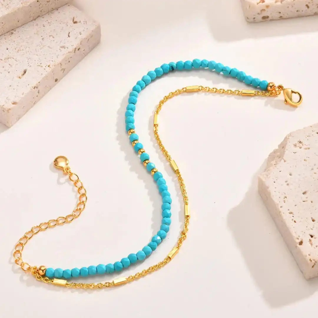 Pulsera de turquesa con doble cadena de oro, estilo atemporal
