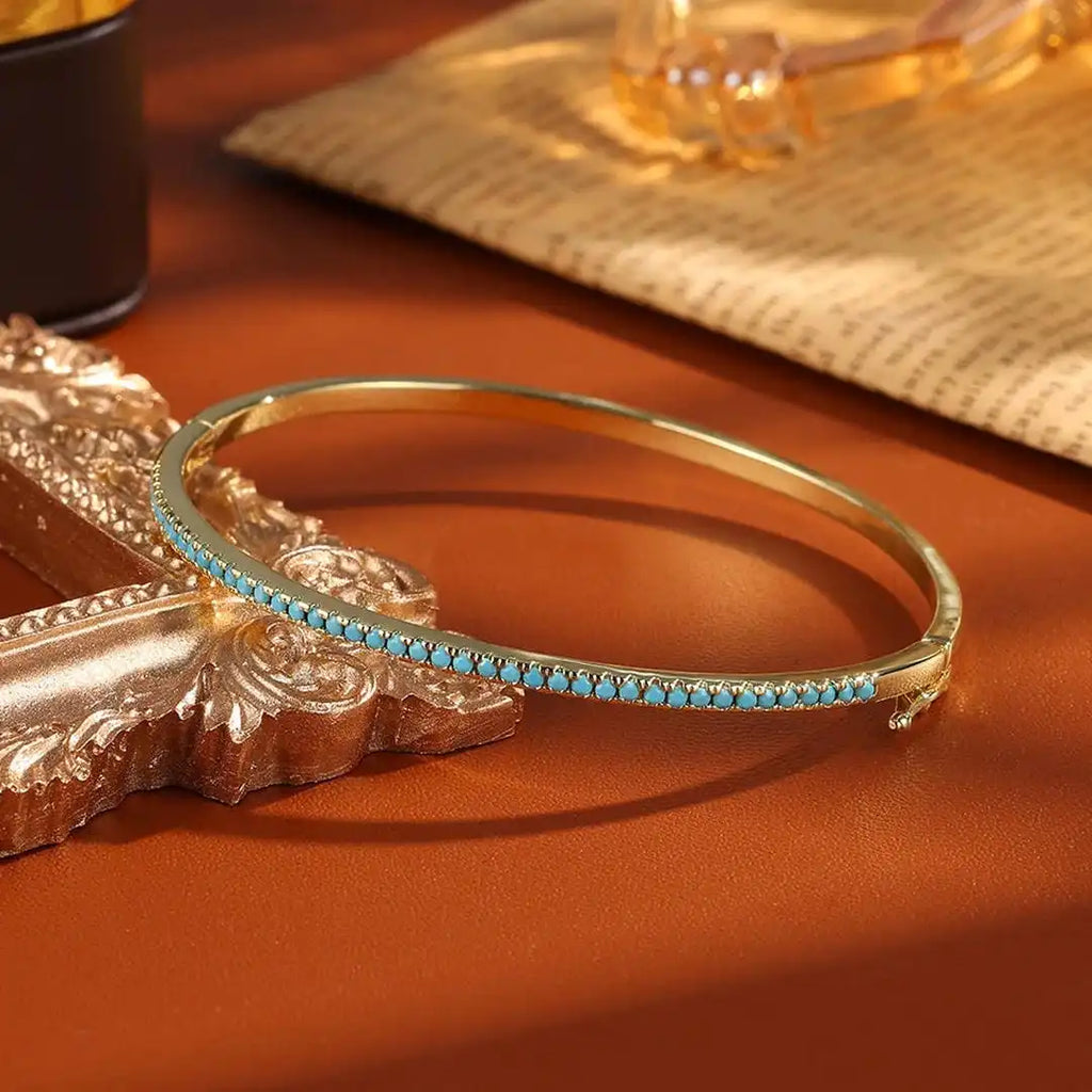 Pulsera de piedra turquesa dorada
