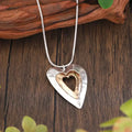 Collar con dije de corazón de plata y oro