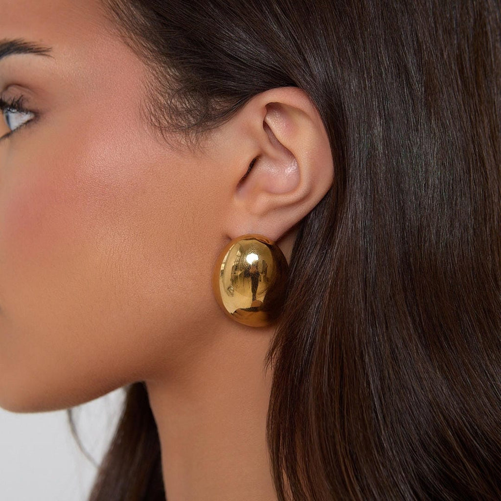 Aretes de aro ovalados de oro pulido