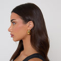 Aretes de aro ovalados de oro pulido