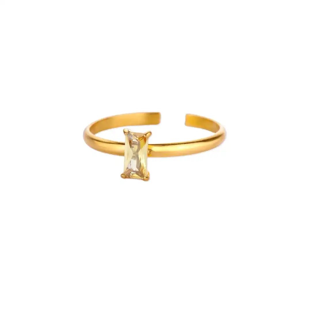 Anillo dorado ajustable y delicado con gema de colores