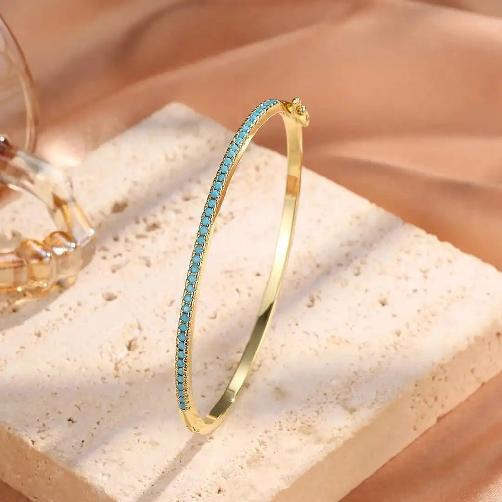 Pulsera de piedra turquesa dorada