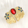 Anillo de puño clásico dorado floral