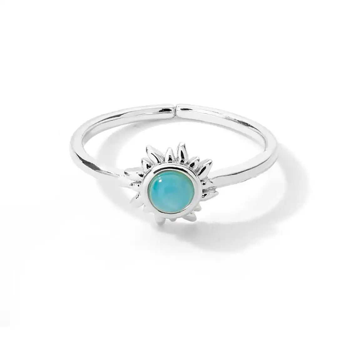 Anillos de sol de ópalo dorados y plateados