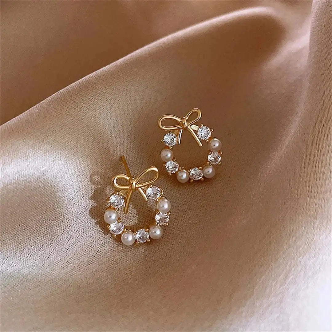 Pendientes de perlas circulares con lazo