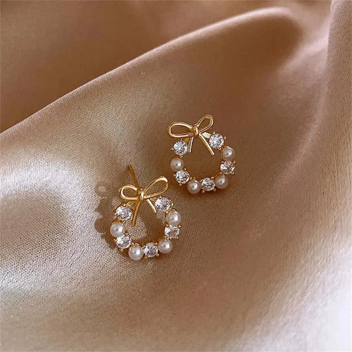 Pendientes de perlas circulares con lazo