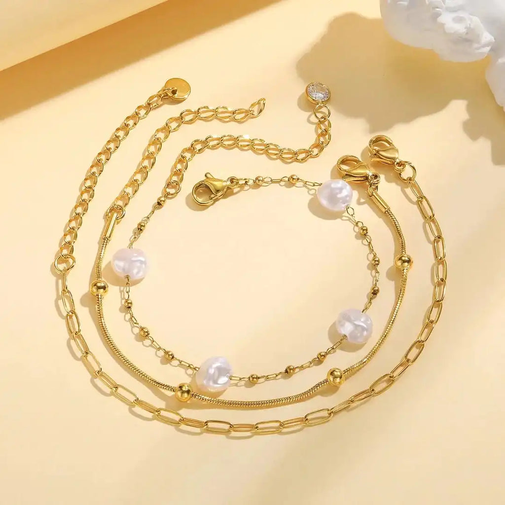 Juego de pulseras apilables de perlas doradas