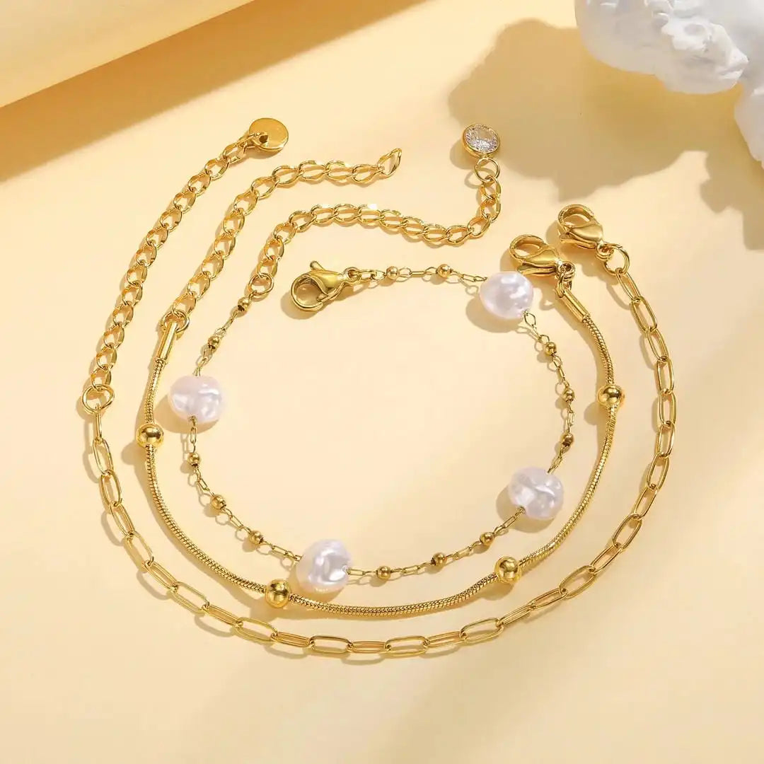 Juego de pulseras apilables de perlas doradas