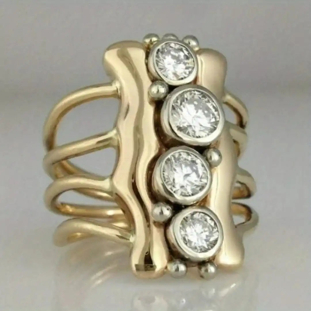Anillo de oro refinado con cristales y múltiples bandas