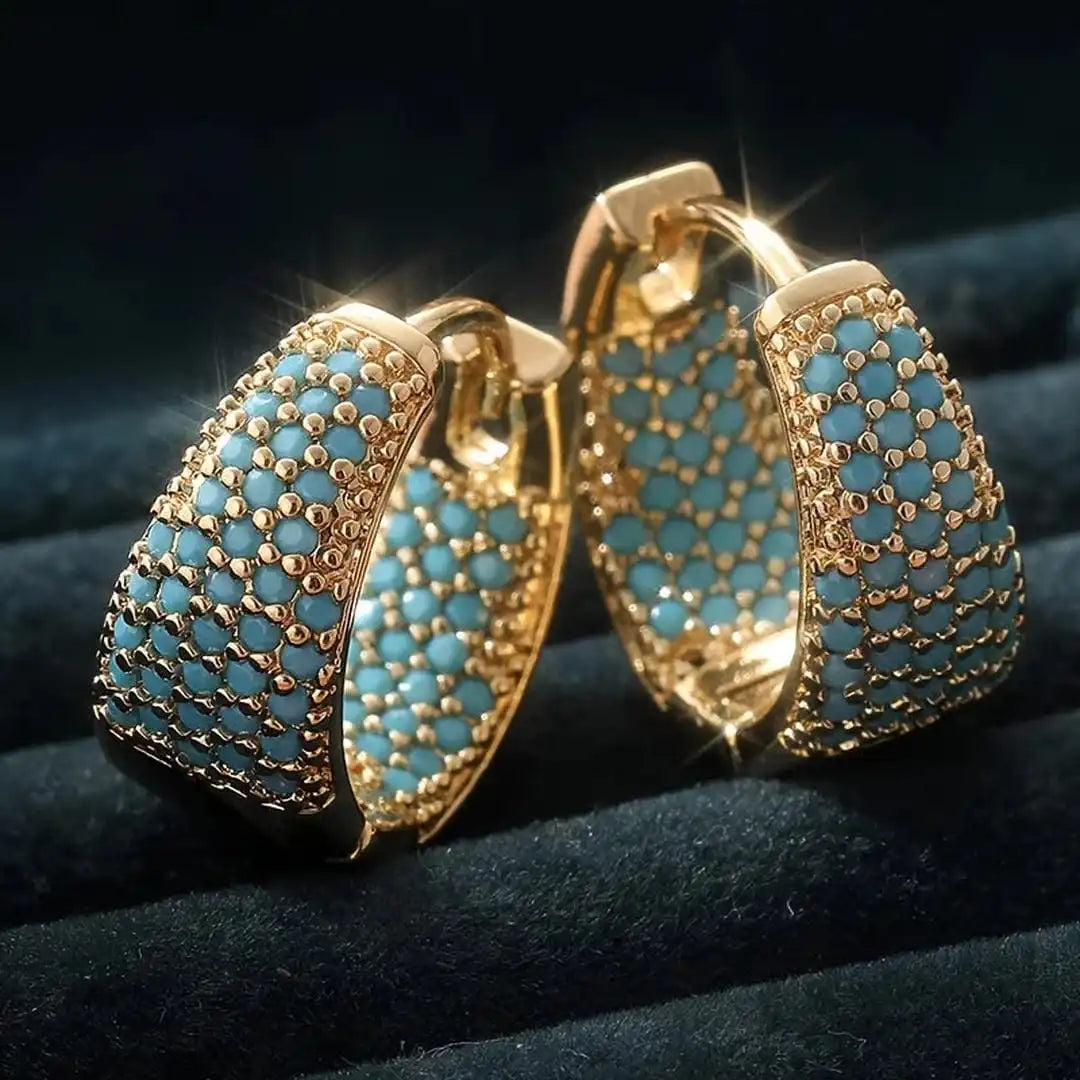 Pendientes de aro florales dorados de turquesa adornada
