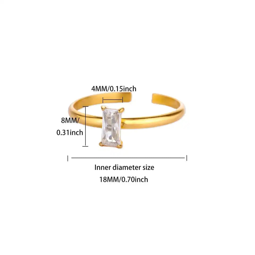 Anillo dorado ajustable y delicado con gema de colores