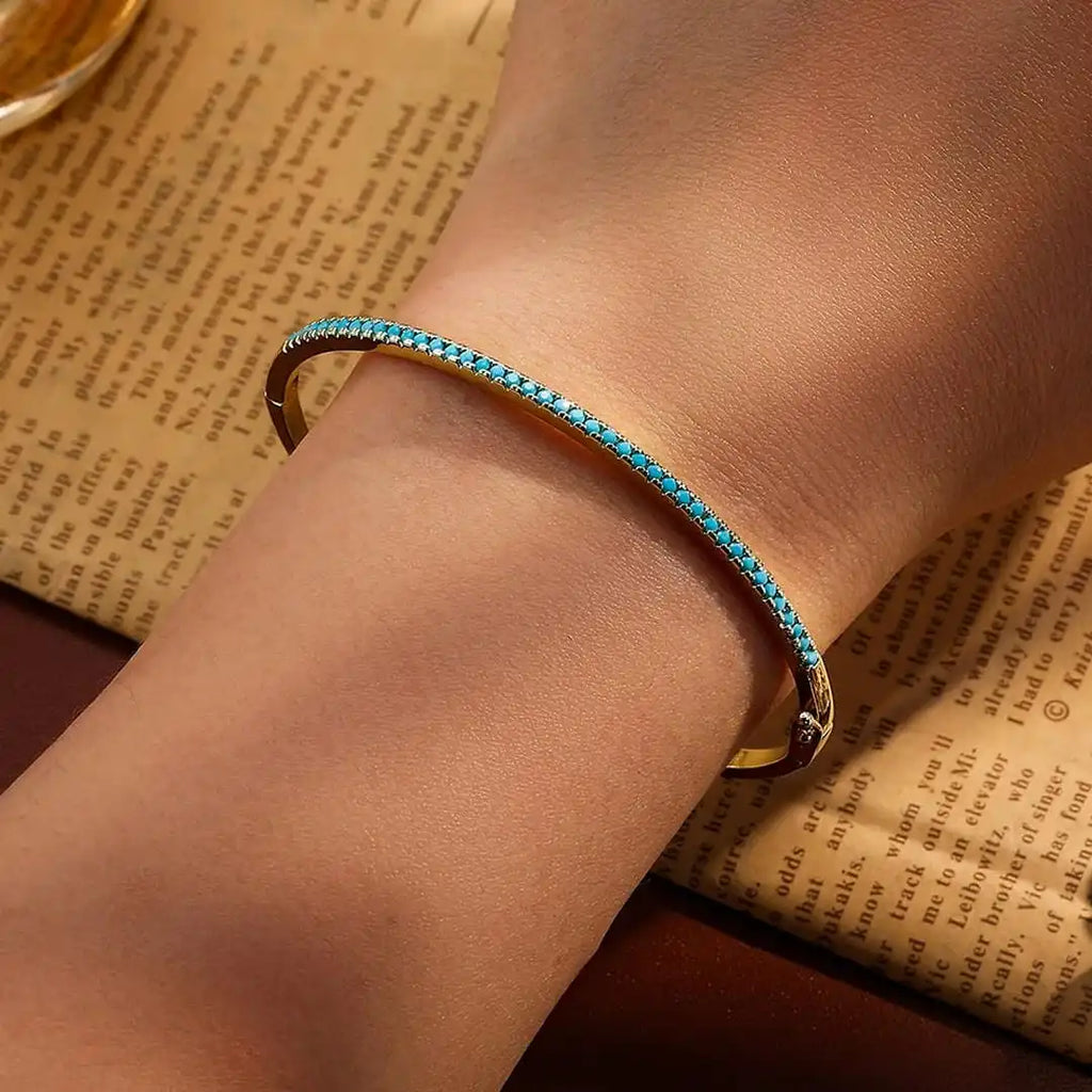Pulsera de piedra turquesa dorada