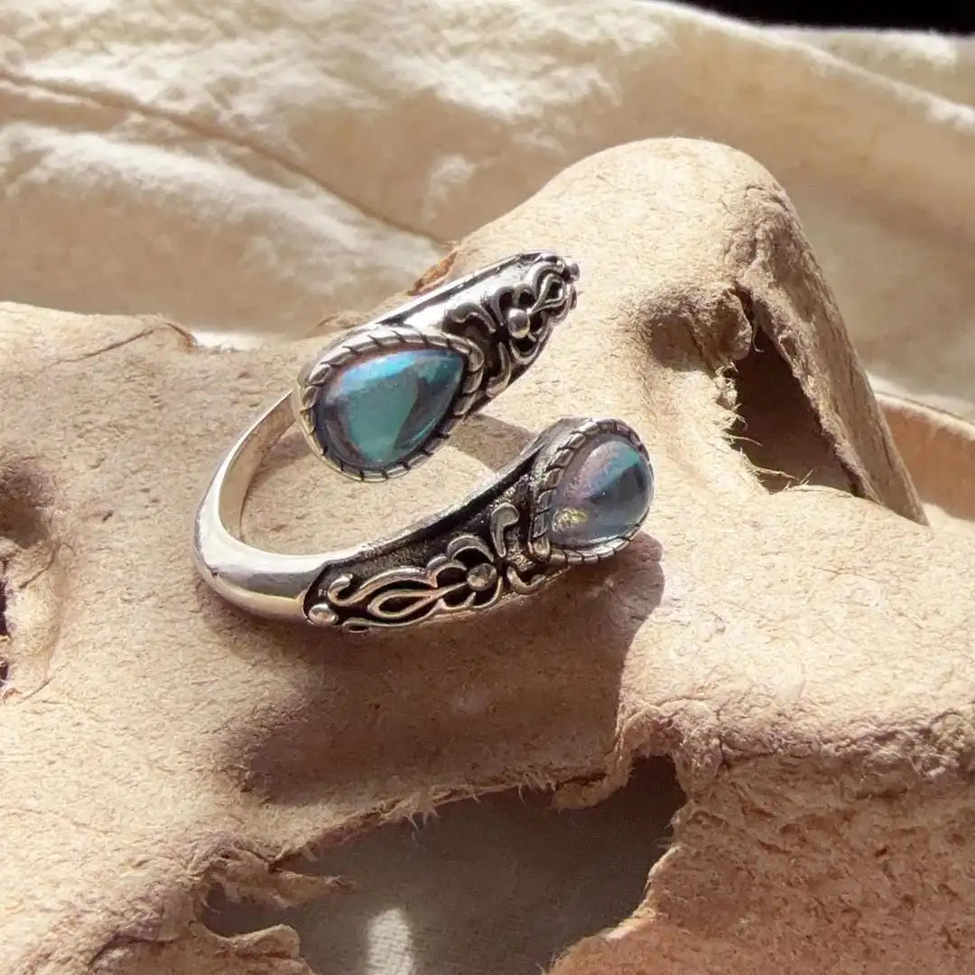 Anillo vintage ajustable de plata con piedra azul
